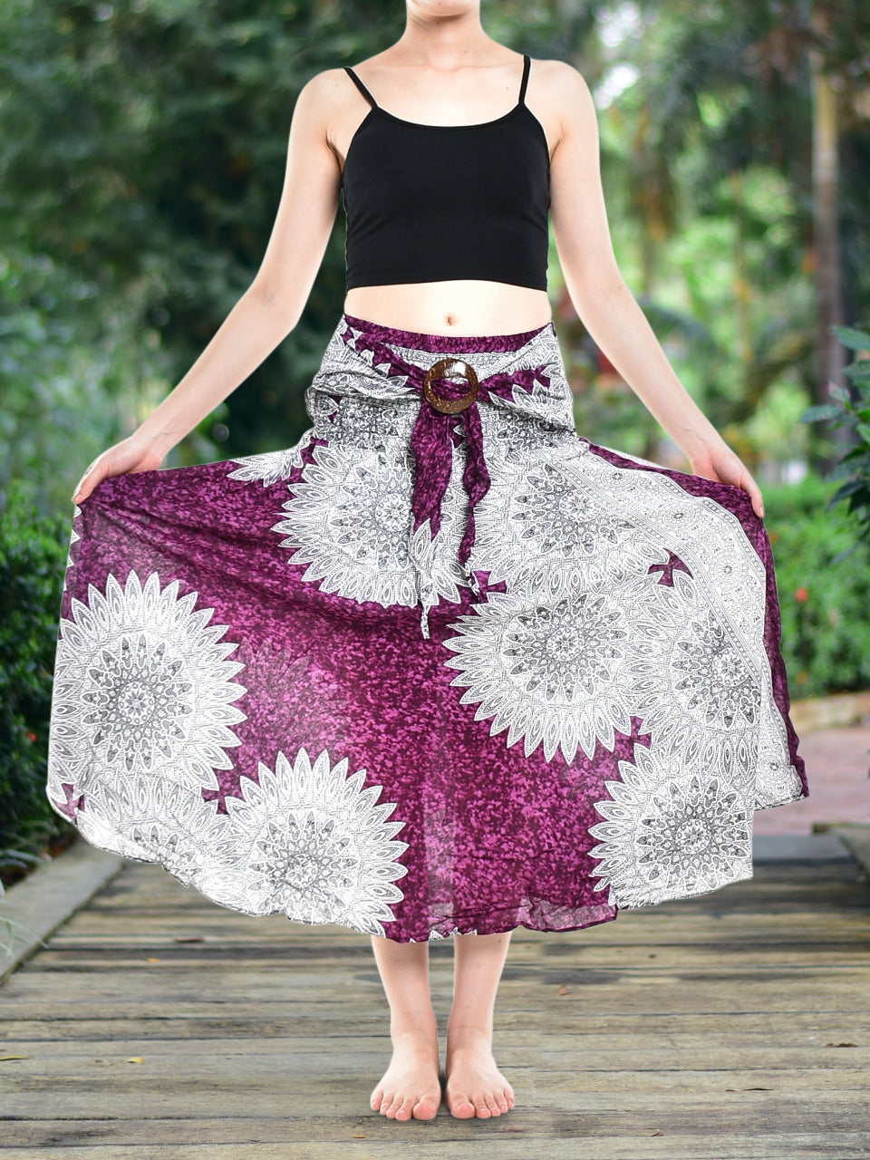 Bohotusk Purple Snowflake Long Skirt featuring a coconut buckle and smocked waist, styled elegantly for versatile wear.